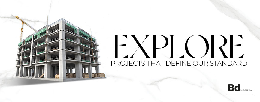 Construction building under construction on the left; bold 'EXPLORE' headline with subtitle 'Projects that define our standard' on a marble backdrop; 'Bd Build & Live' logo bottom right.