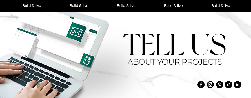 Hero banner with hands typing on a laptop beside a marble surface and the headline 'TELL US ABOUT YOUR PROJECTS' with social icons nearby.